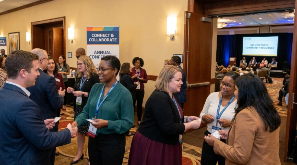 Attendees networking at Mental Health America annual conference session panel